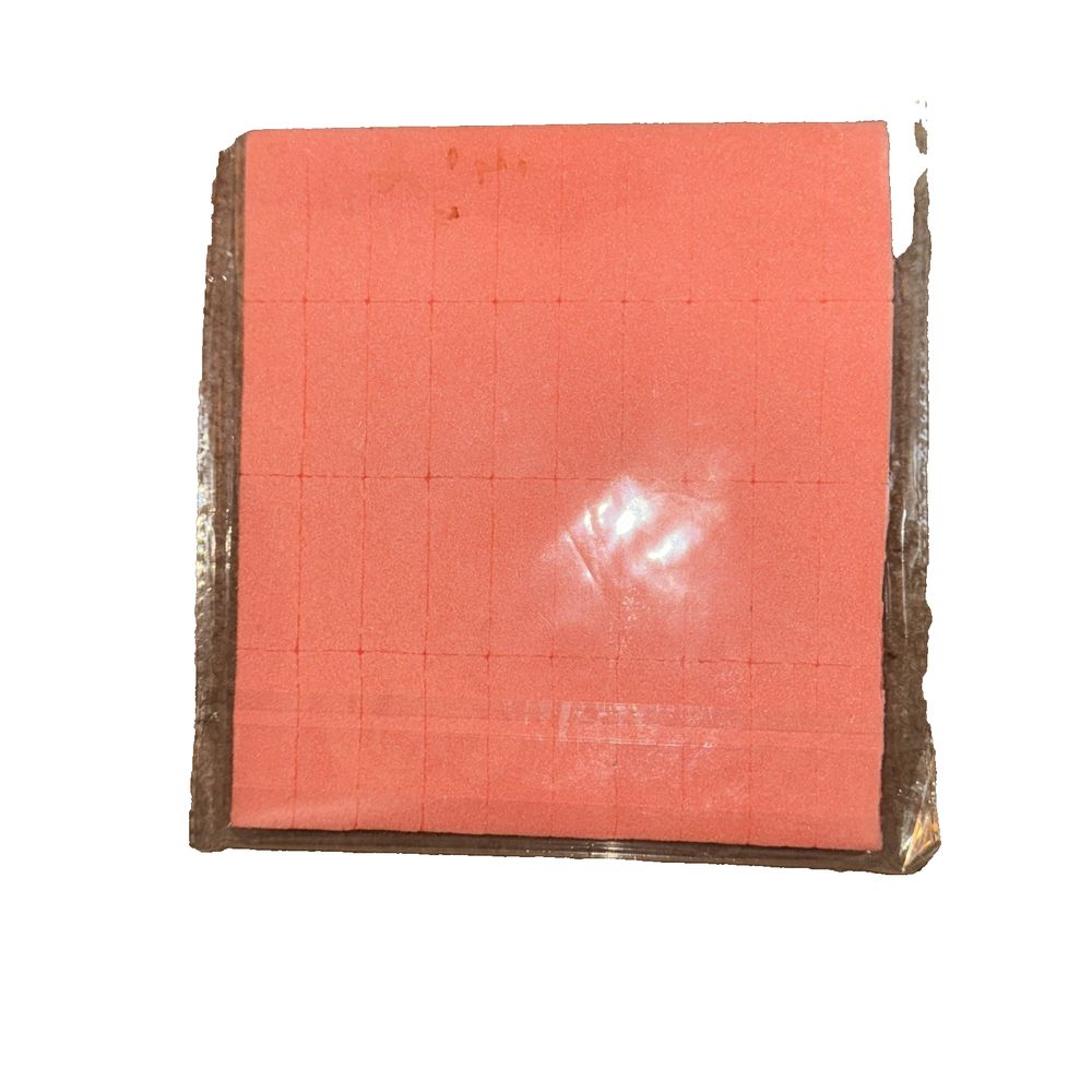 Block Mini ORANGE Disposable Buffers 40 Per Sheet, Unbranded – a piece of paper with a red sheet on it