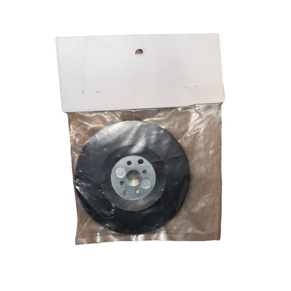 4-1/2" x 5/8"-11 Rubber Backing Pad for Resin Fiber Disc, Koltec USA – a black plastic wheel with a white plastic backing
