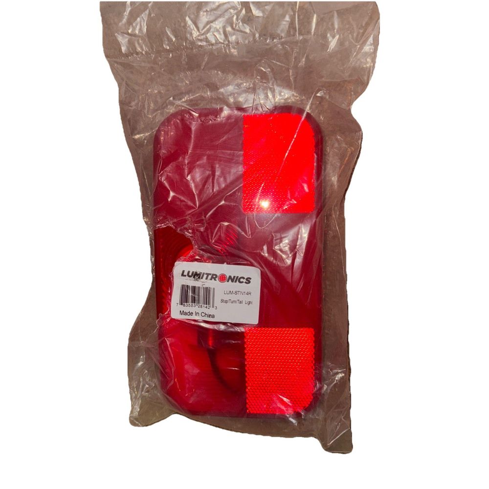 Lumitronics Surface Mount Tail Light for Safe Driving On The Road – a red plastic bag with a plastic handle