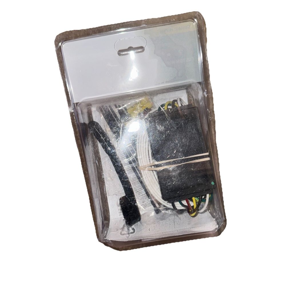 CURT 56412 Vehicle-Side Custom 4-Pin Trailer Wiring Harness – a black and white bag with a small black and white bag