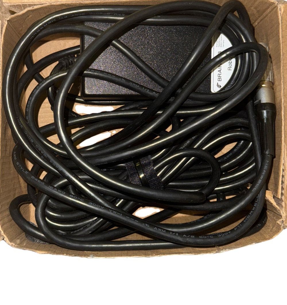 TR60M24-B1 AC-DC Power Supply For Medical Equipment (No Wall Plug), Cincon – a box of black cables