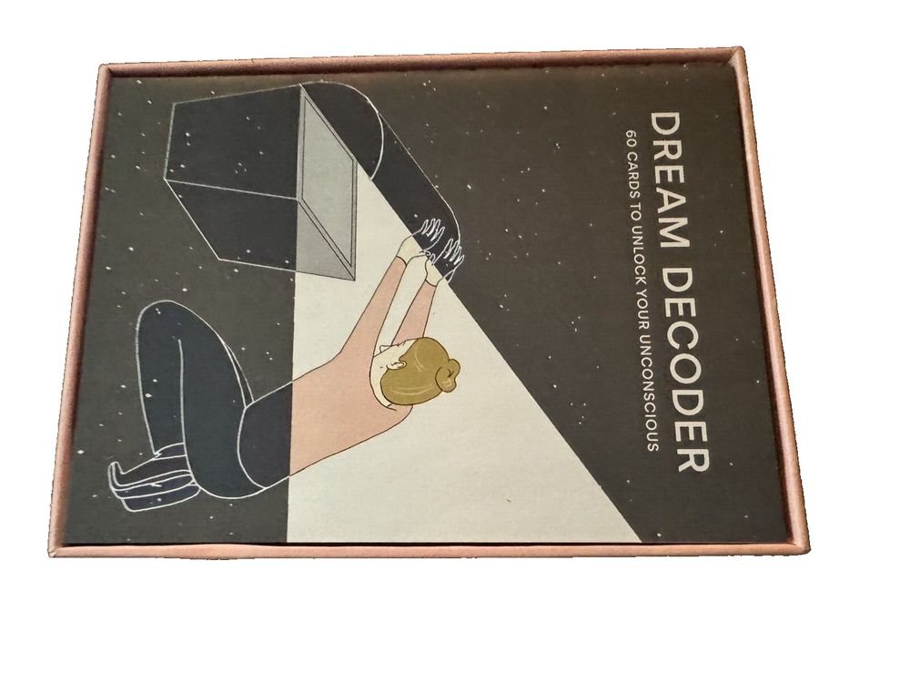 Dream Decoder: 60 Cards to Unlock Your Unconscious, DaveyDooDeals – a book with a hand reaching out the door