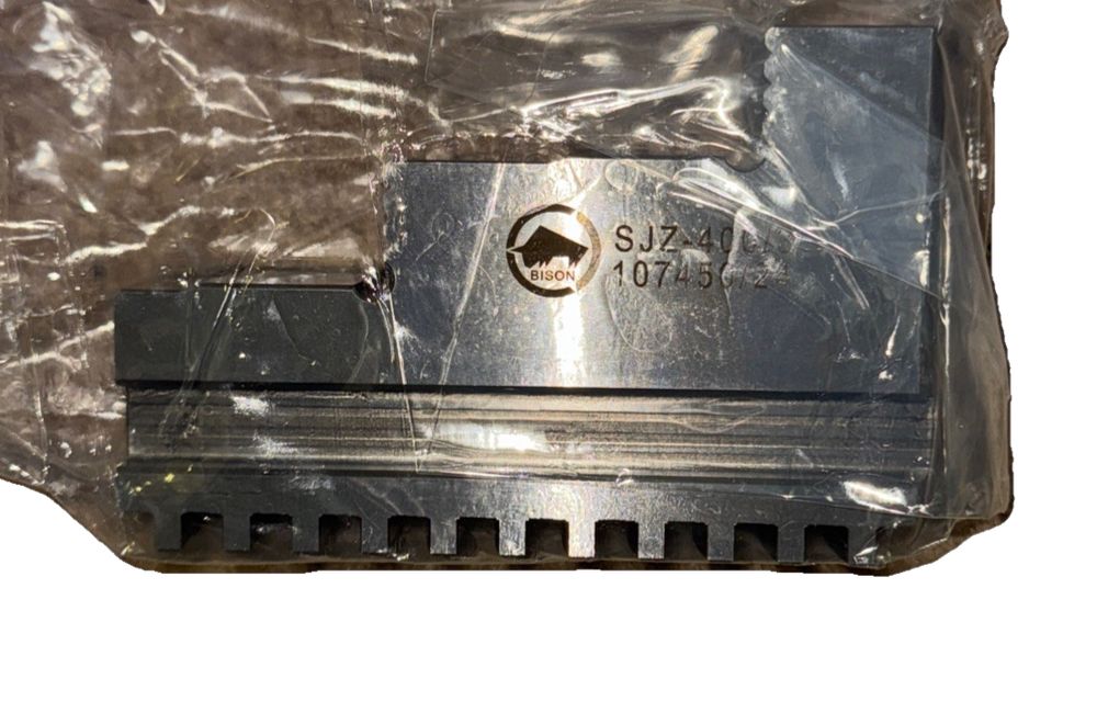 Bison drill jaw set SJZ 400/3 (Comes with all 3), Bison Designs – a piece of plastic with a metal handle