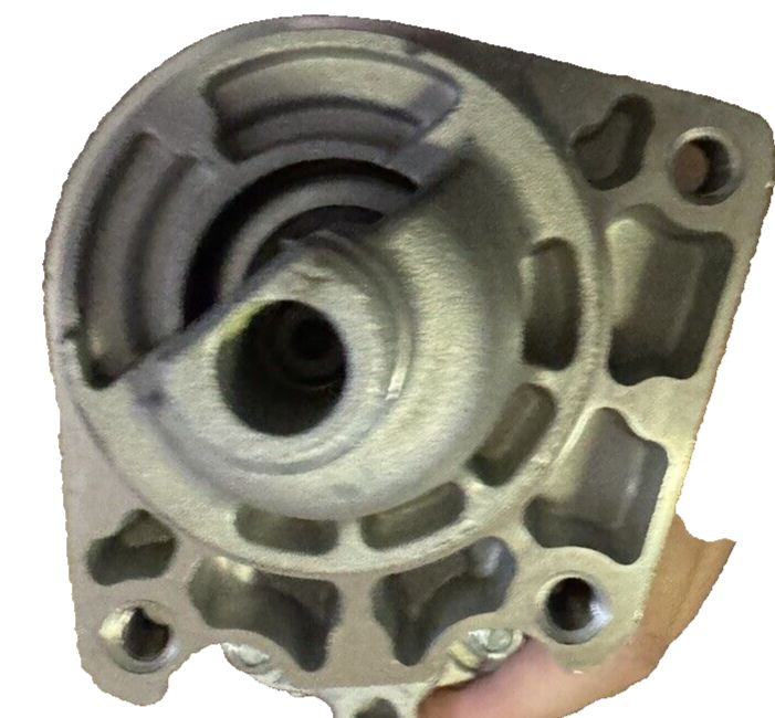 TYC 1-17949 Chrysler Town and Country Replacement Starter – a close up of a cylinder with a hole in the center