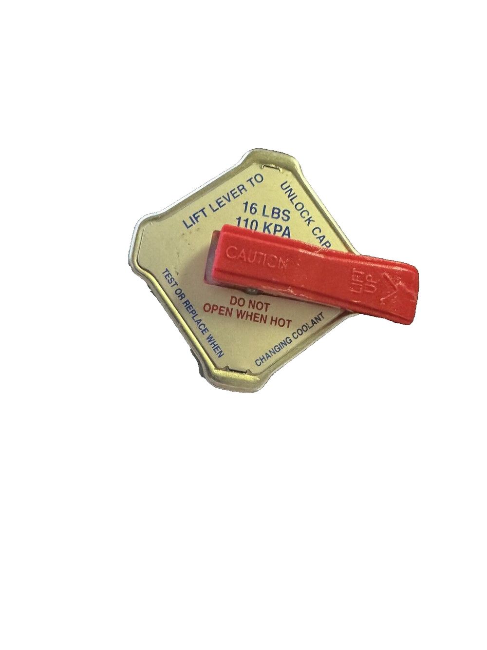 Stant Radiator Cap Silver – a red rubber pad with a white background
