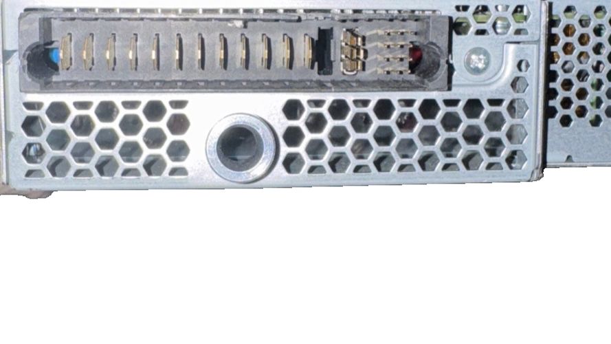 Flextronics 12.25V Switching Power Supply - 81.5A MIS-S-2100ADE00 – a close up of a metal dieing machine