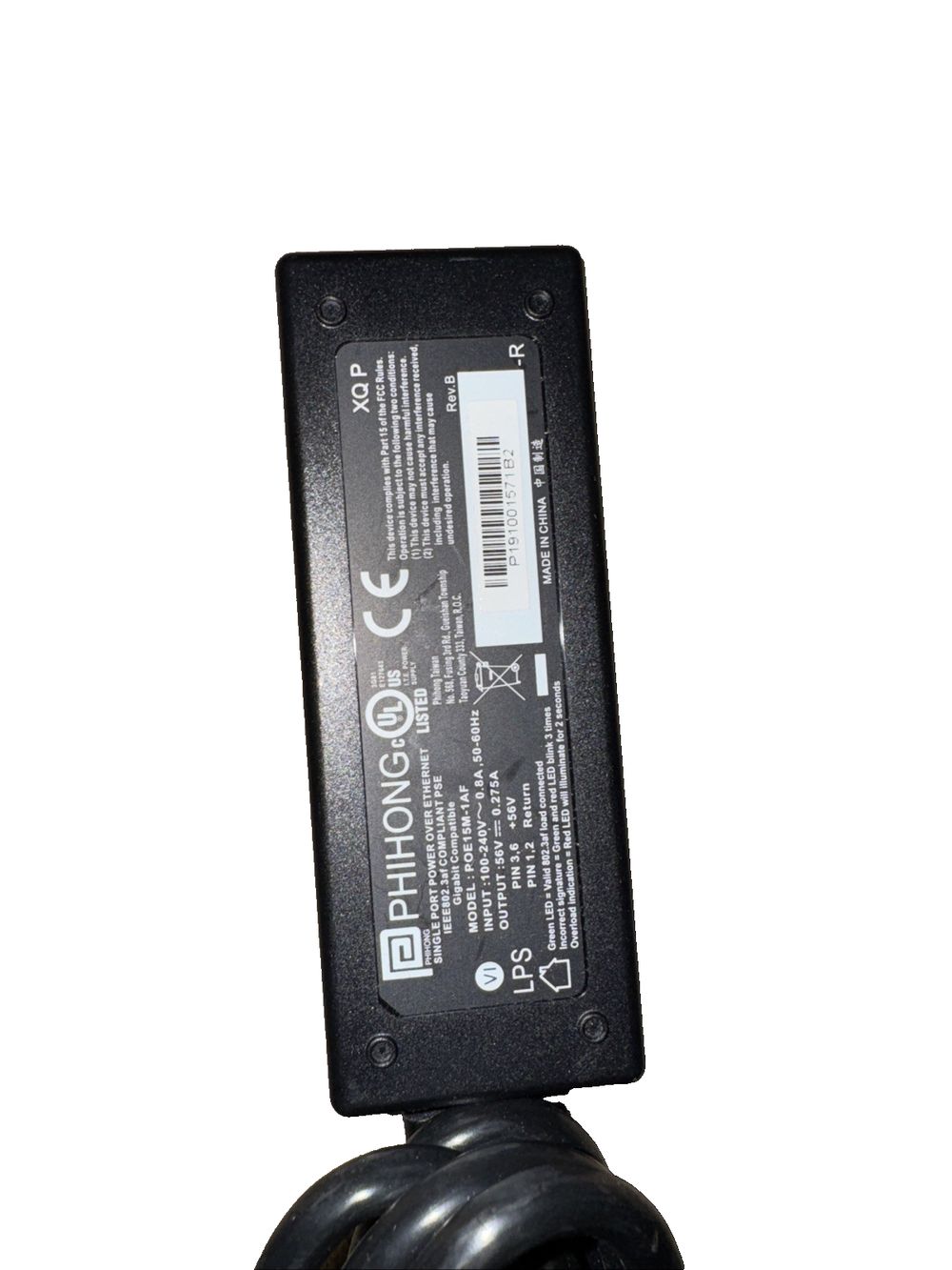 Single Port Power Over Ethernet POE15M-1AF PHIHONG – the back of a black ball with a white background