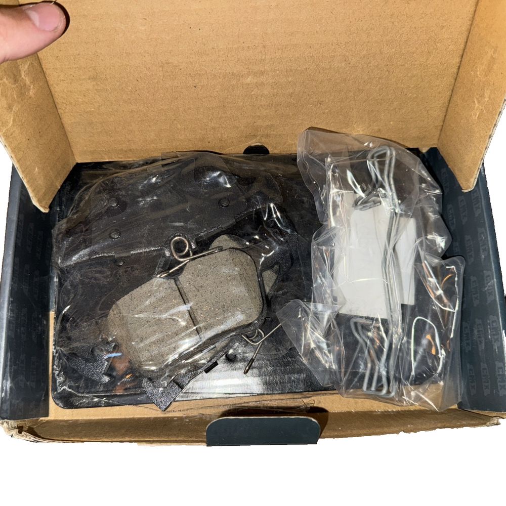 Rear Ceramic Disc Brake Pads CMX-D1665 Replacement For Ford Escape Edge Fusion – a box with a small device inside of it