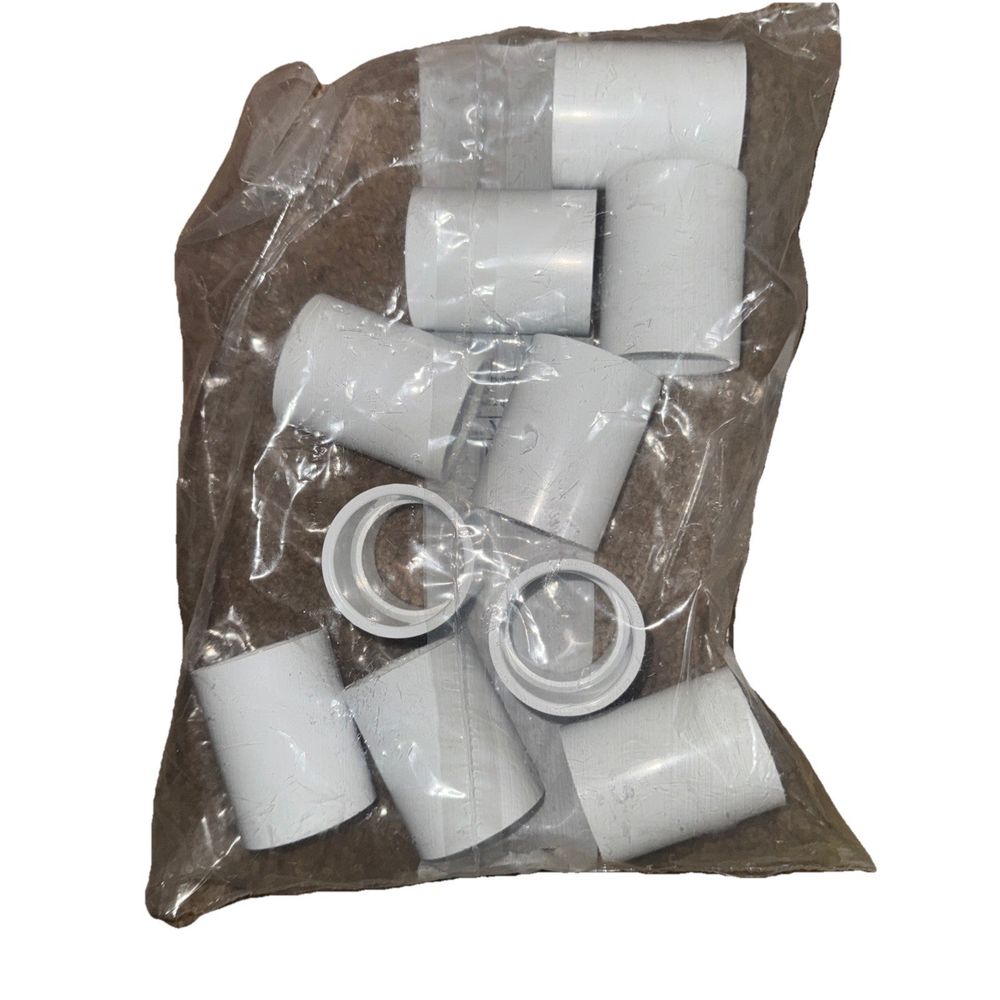 Dura 429-015 PVC 1-1/2" Schedule 40 Coupling - Slip X Slip Bag of 10, DaveyDooDeals – a bag of white plastic pipe covers