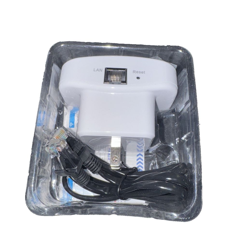300m wifi repeater more range for every wlan network, Unbranded – a white charger with a black cord