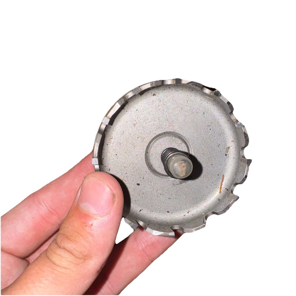 IDEAL 36-310 TKO™ 2-1/2" Carbide-Tipped Hole Cutter – Fast & Burr-Free, DaveyDooDeals – a hand holding a metal object with a hole