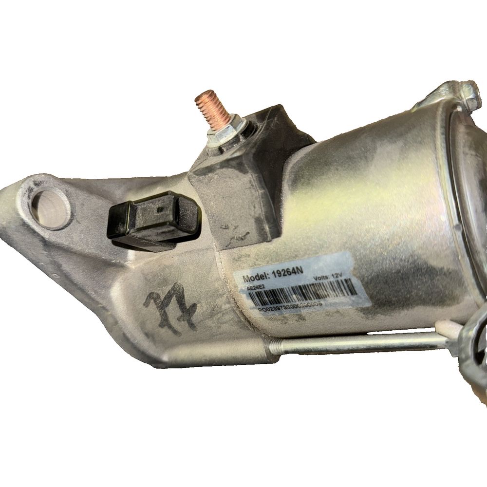 WAI Global 19264N Starter, Unbranded – a metal motor motor with a white background