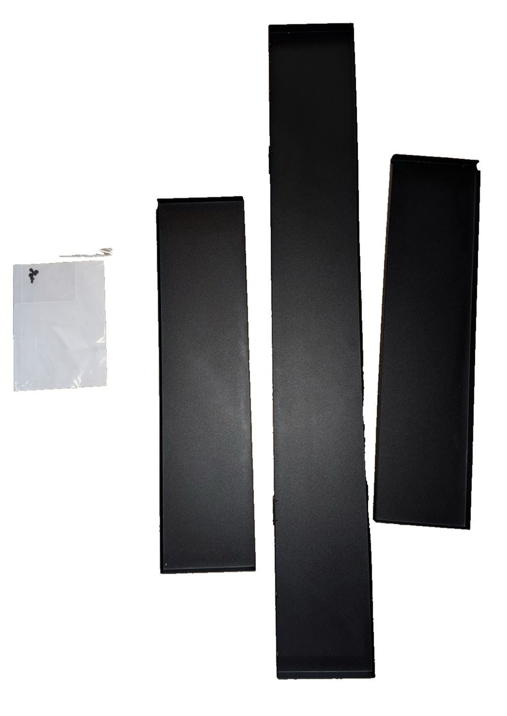Dreamflame® Electric Fireplace Trim Kit - For 33inch Fireplace – a pair of black plastic sheets with a clear plastic bag