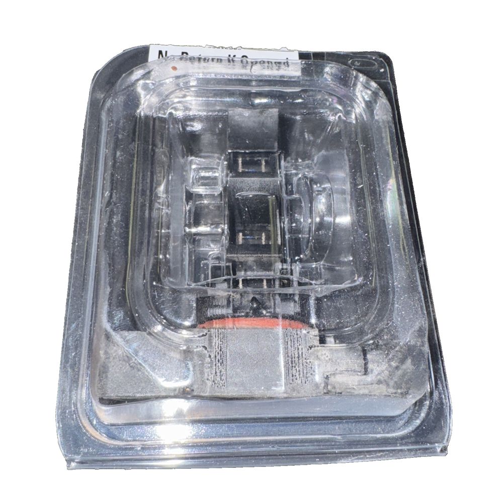 Delphi AF10061 Mass Air Flow Sensor – a plastic container with a plastic lid