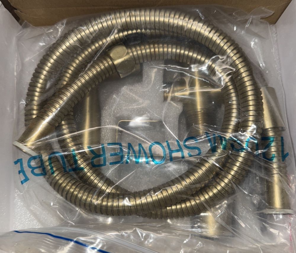 Senhozi Stainless Steel Bidet Sprayer for Toilet, Gold Finish with Jet and Soft – a box with a hose and a hose tube
