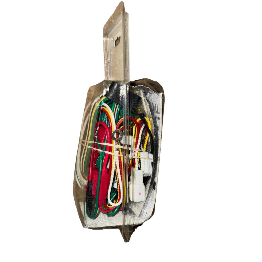 CURT Manufacturing 56267 Vehicle-Side Custom 4-Pin Trailer Wiring Harness – a small electrical device with wires and wires