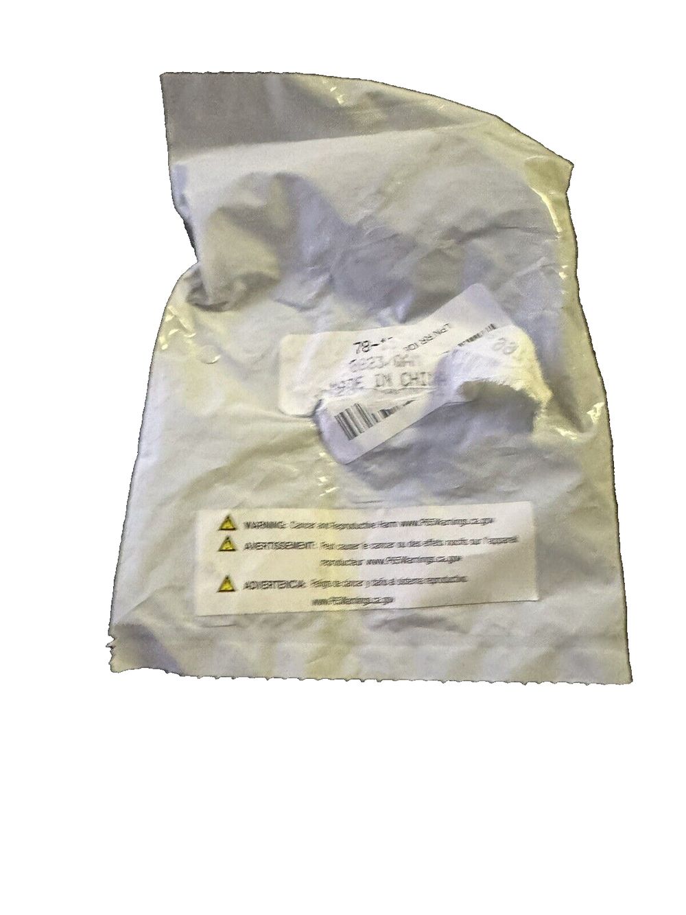 Raybestos WK1571 Professional Grade Disc Brake Caliper Boot and Seal Kit – a bag of white powder