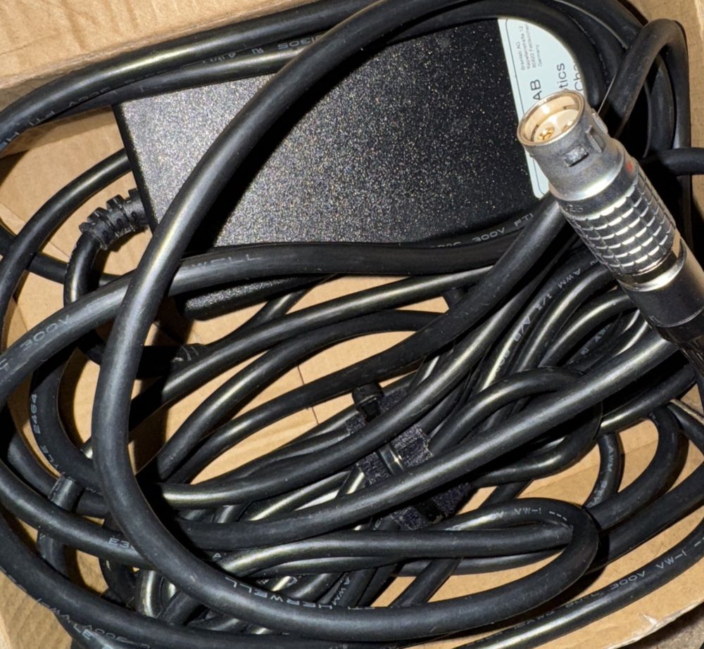 TR60M24-B1 AC-DC Power Supply For Medical Equipment (No Wall Plug), Cincon – a box with a bunch of cables in it