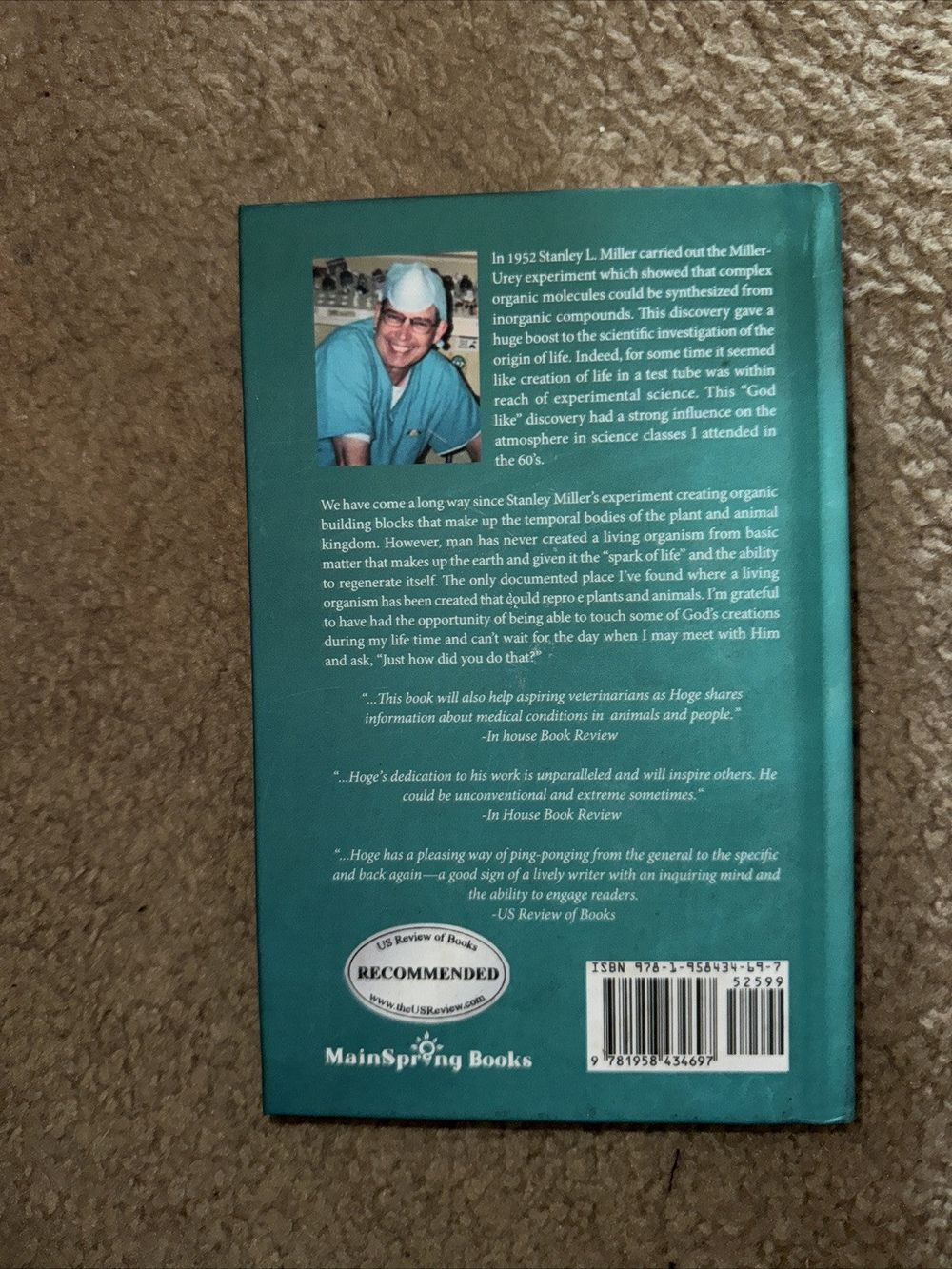 Thoughts on my Thoughts: The TALES That Wagged This Veterinarian, DaveyDooDeals – the book is on the carpet