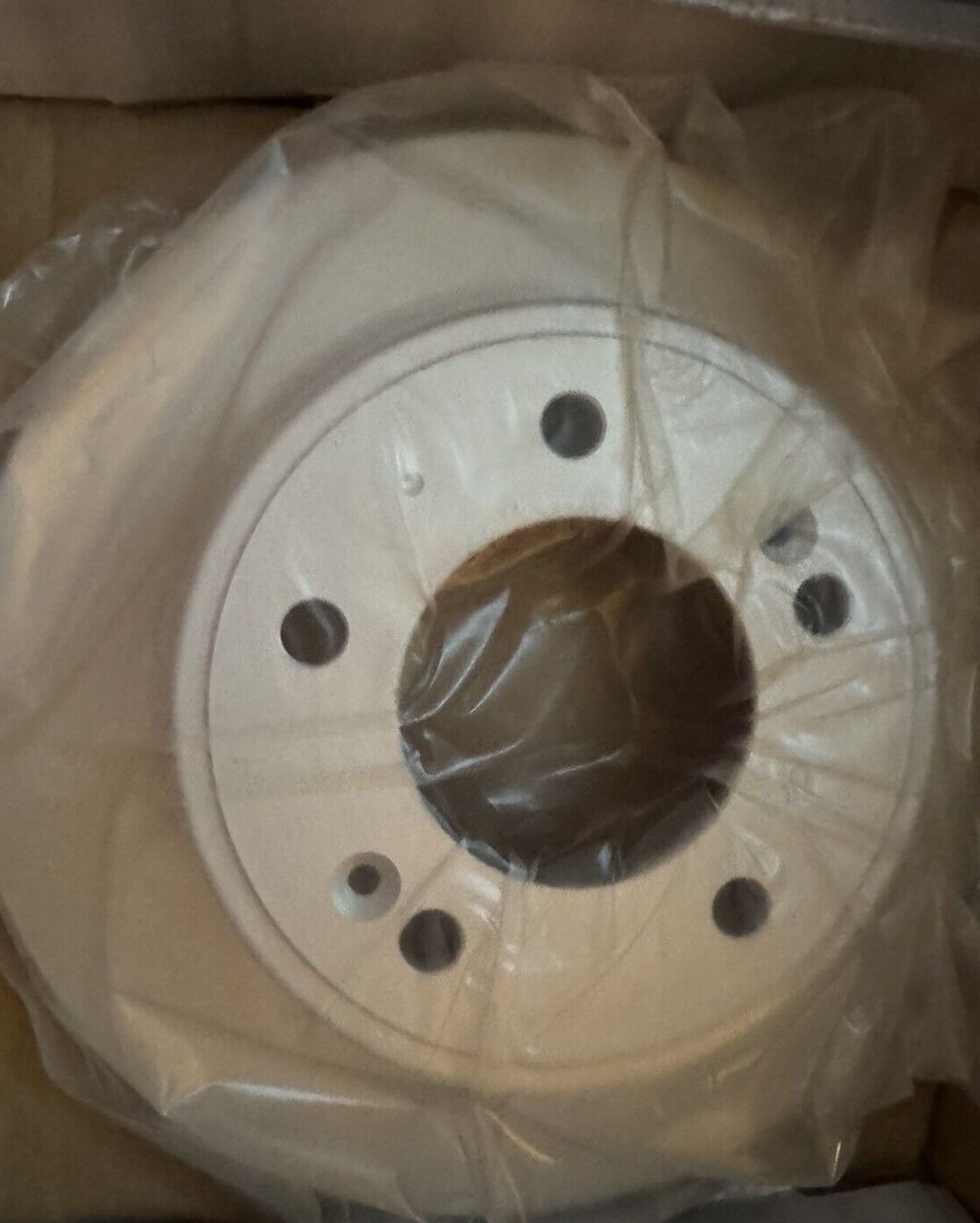 Raybestos 980957FZN Rust Prevention Technology Coated Rotor Brake Rotor, 1 Pack – a white toilet paper