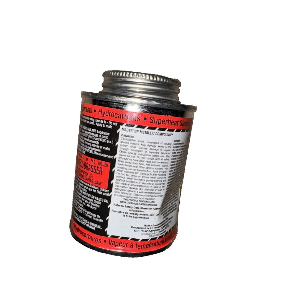 MASTERS Metallic Compound, Brush-Top Can, 250 ml, 0° C - 287° C (32° F - 550° F – a can of black paint on a white background
