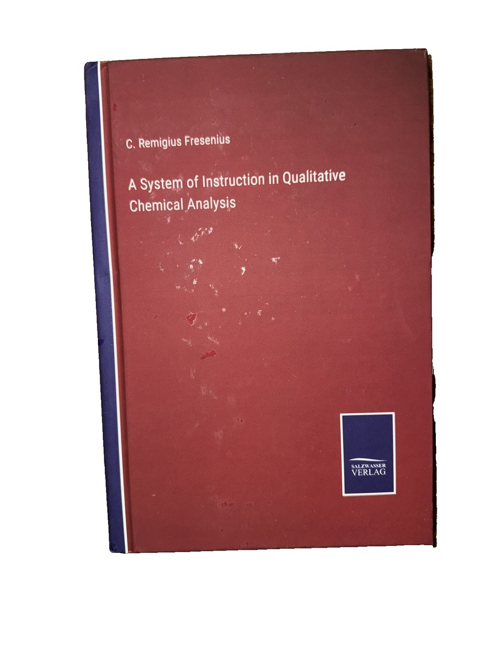 A System of Instruction in Qualitative Chemical Analysis, DaveyDooDeals – a book with a red cover and blue cover