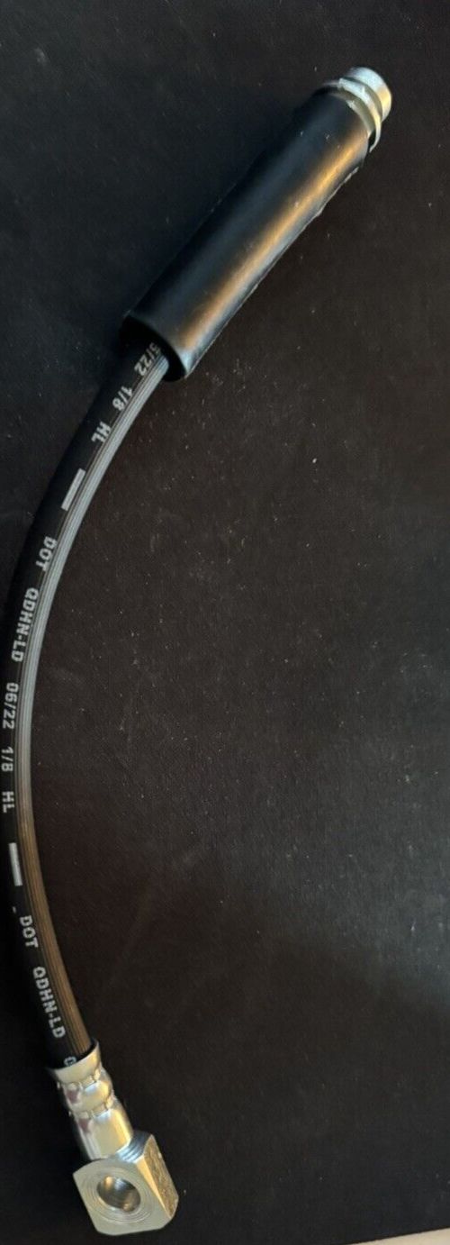 Dorman H380467 Brake Hydraulic Hose Compatible with Select Chevrolet - Oldsmobil – a close up of a metal handle on a black surface