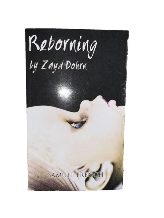 Reborning Paperback – Feb. 6 2013, DaveyDooDeals – a book with a white cat on it
