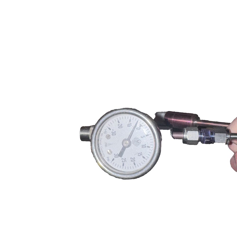 MQT Valve Gas Gauge Transfer Tool – Essential for Precise Gas Sampling, DaveyDooDeals – a person holding a pressure gauge