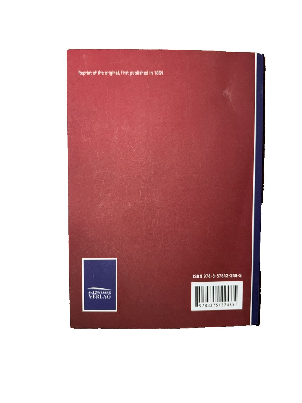 A Handbook for India, DaveyDooDeals – a red hardcover notebook with a blue cover