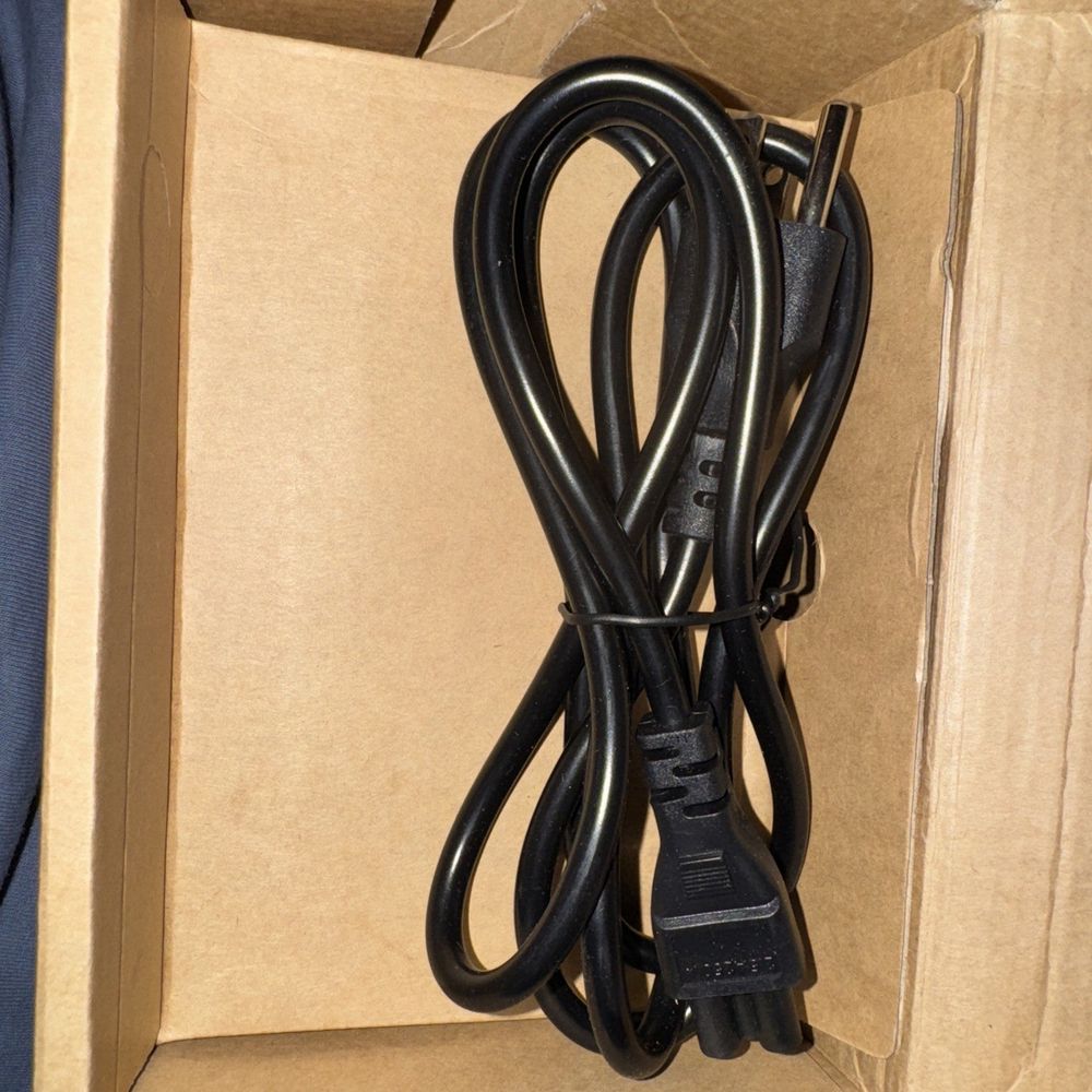 Fixed Wireless Terminal, Unbranded – a black cable connected to a black cord