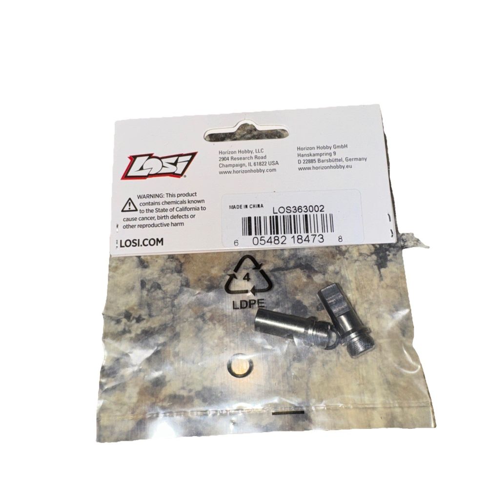 Losi LOS363002 Titanium Front Fork Lugs 2 PM-MX – a small metal hook with a white label on it
