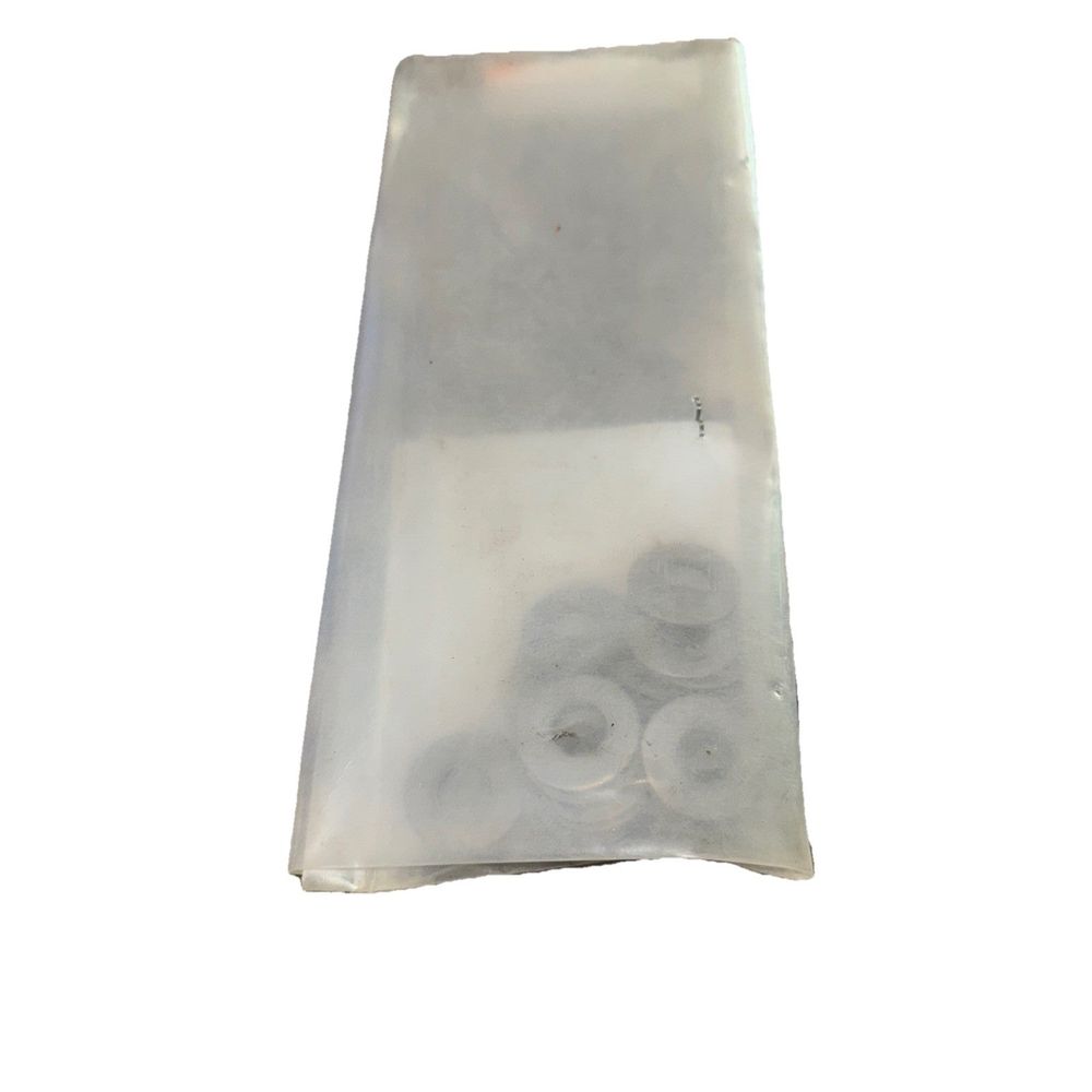 800-340G010801 Washer 22 Pack, Koch-Glitsch – a piece of silver foil on a white background