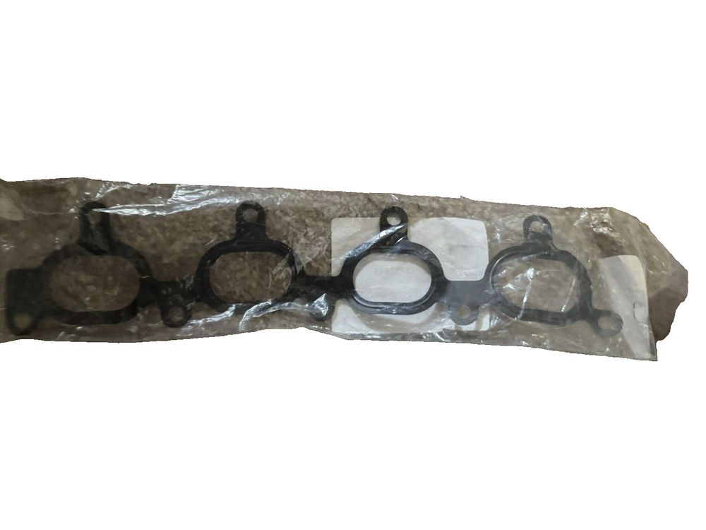 Mazda BP4W-13-111 Engine Intake Manifold Gasket – a pair of black and white plastic straps