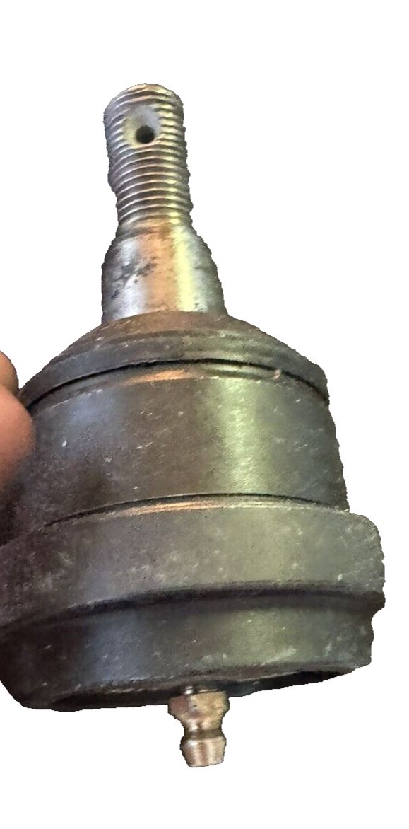 MOOG K7394 Front Upper Suspension Ball Joint for Dodge Ram 2500 – a hand holding a metal ball with a nut