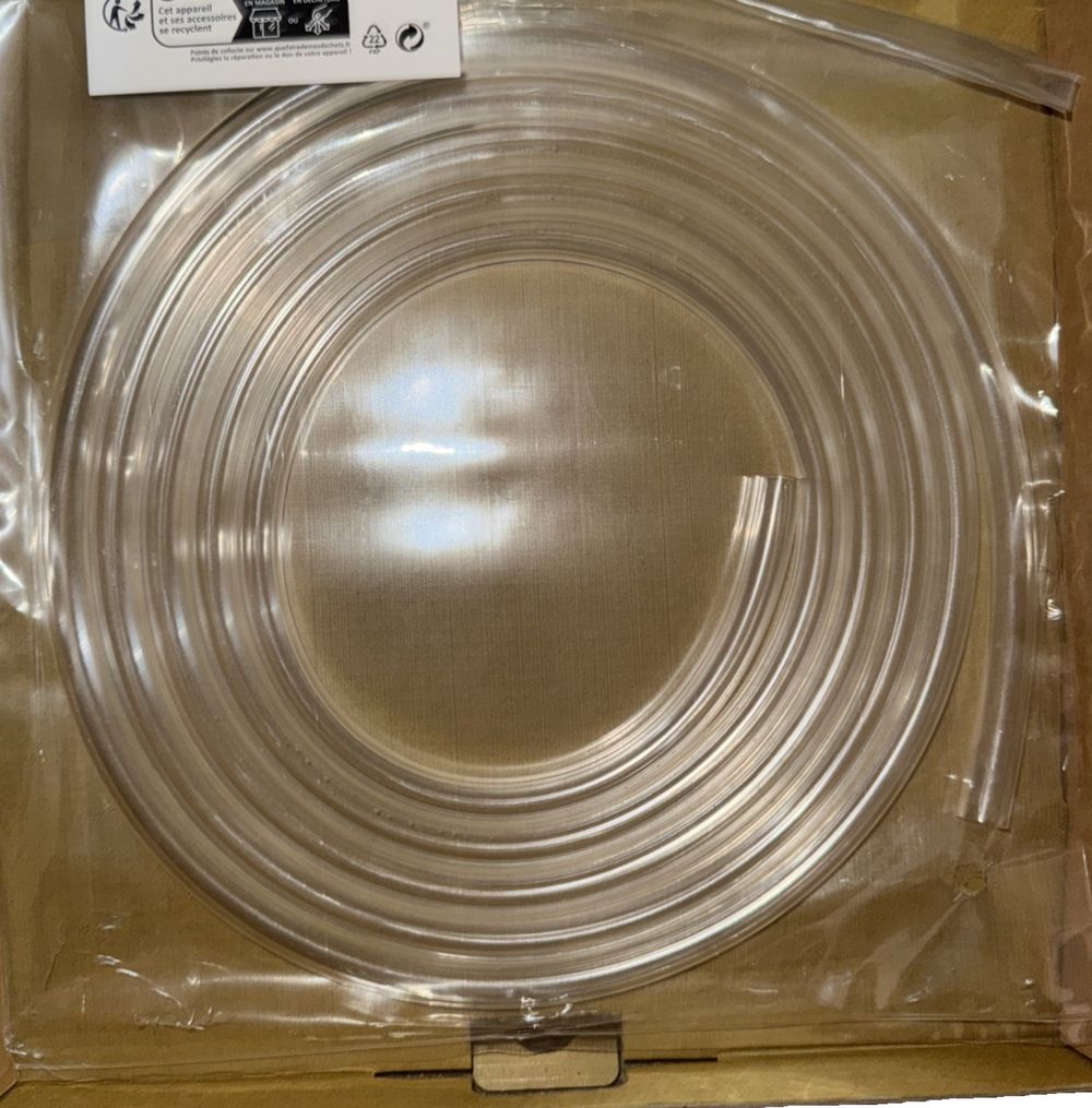 Corsair Hydro X Series XT Softline Tubing – a round metal plate in a box