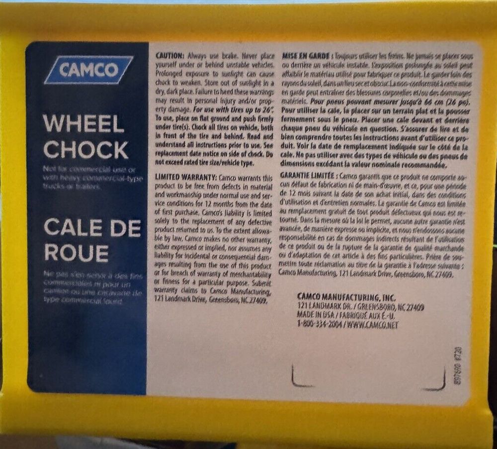 Camco Wheel Chock w-Rope for Easy Removal - Helps Keep Your Trailer or RV in Pla – a yellow box with a label on it