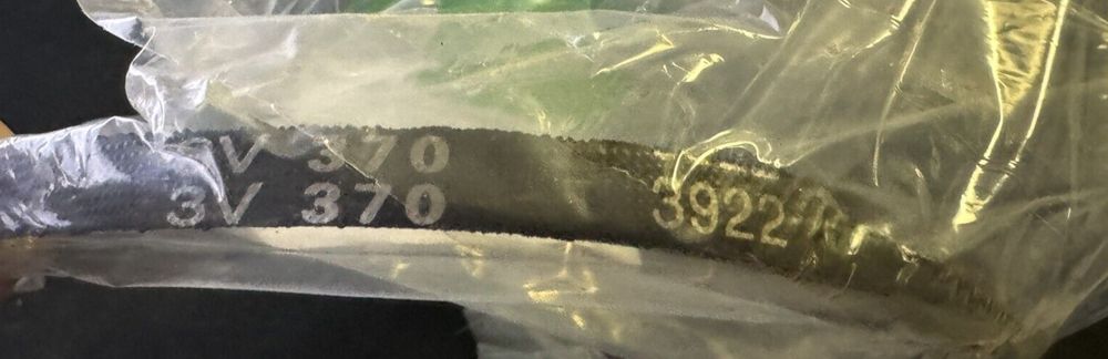 D&D PowerDrive 3V370 V Belt, Rubber, 3/8" x 37" OC – a person holding a bag of food
