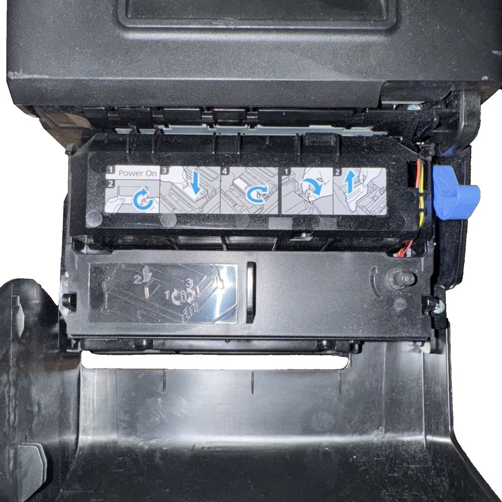 Epson TM-H6000V Thermal Receipt Printer Multifunction M253B – No Power Adapter, DaveyDooDeals – a printer with a blue ribbon attached to it