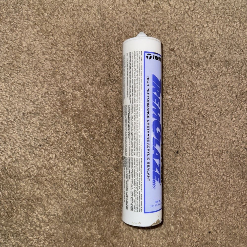 AUA1300 Trem Glaze Acrylic Sealant, TremGlaze – a can of paint sitting on the floor