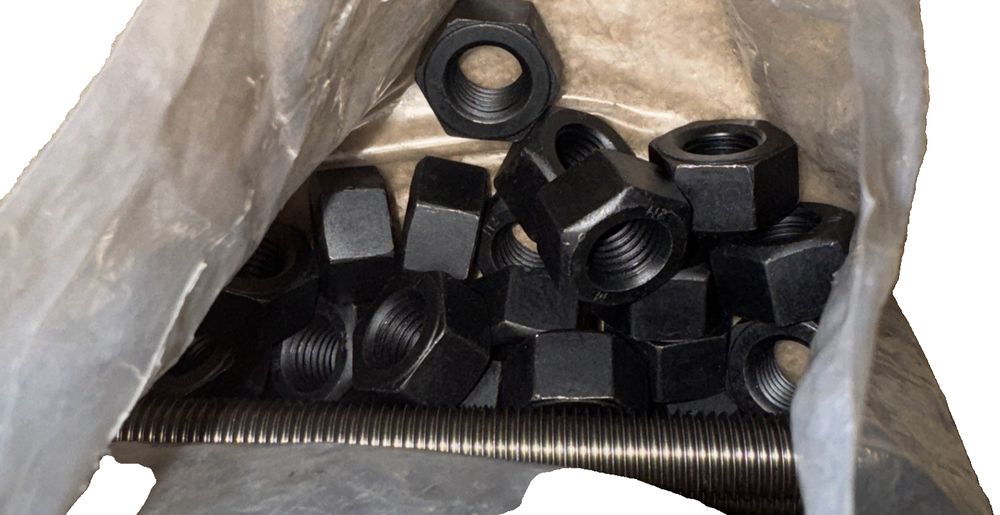 3/4"x7-1/2" B7 Studs W/2 2H Hex Nuts 16 Pack, TTL – a pile of nuts and bolts in a bag