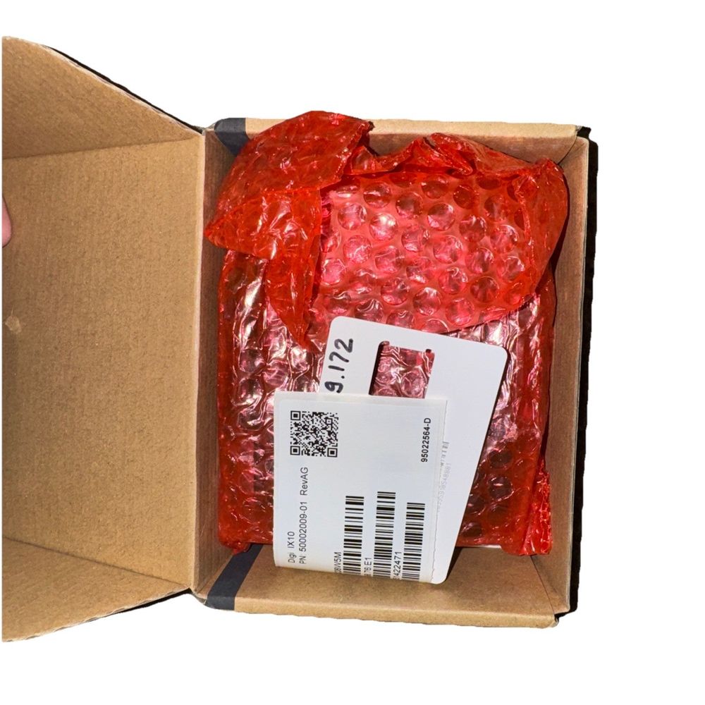 Digi IX10 Industrial Cellular Router – a box of red plastic wraps