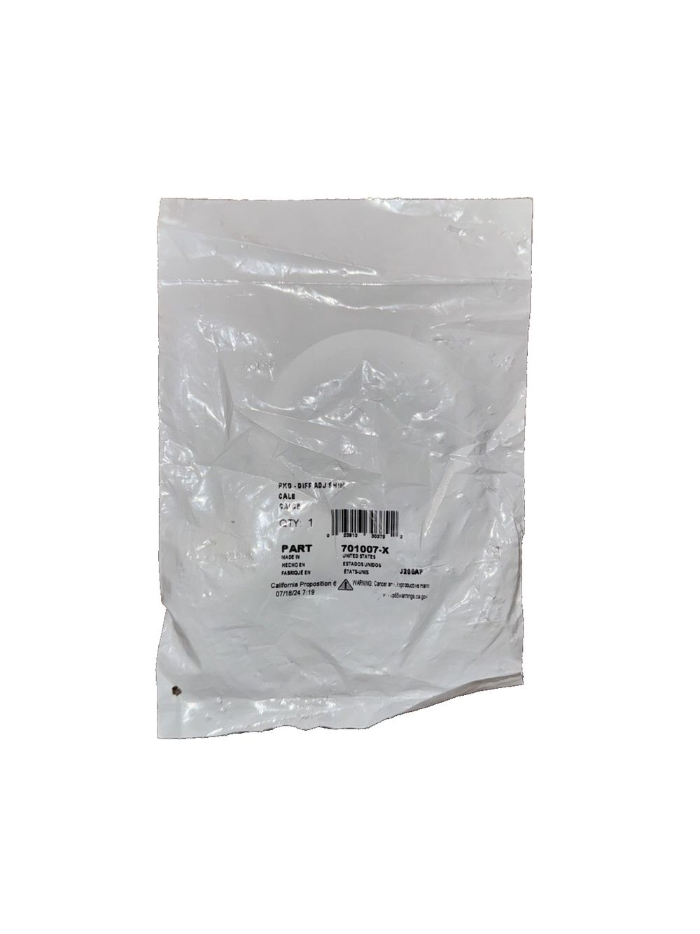 Spicer 701007X Differential Carrier Bearing Shim Kit Dana 60 61 70 71 80 – a white plastic bag with a white plastic handle