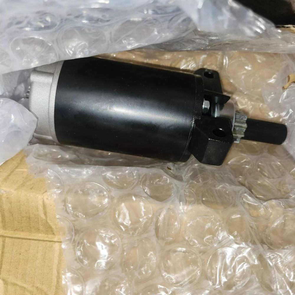 DB Electrical 410-21026 Outboard Starter - Compatible with Mariner & Mercury 3 H – a black motor motor in a plastic bag