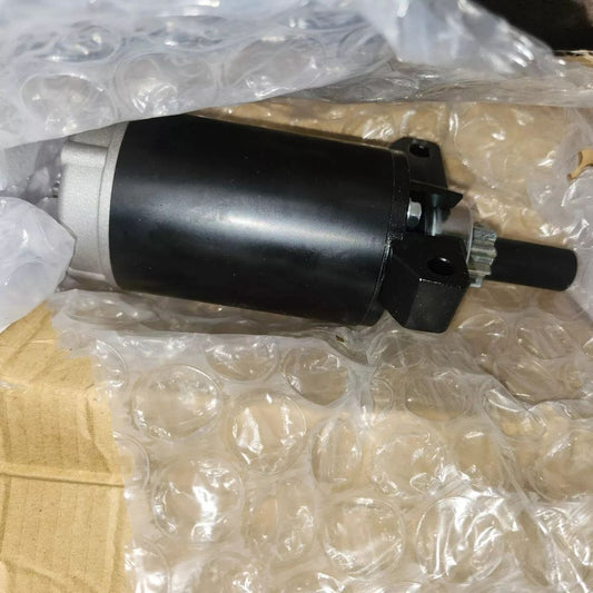 DB Electrical 410-21026 Outboard Starter - Compatible with Mariner & Mercury 3 H – a black motor motor in a plastic bag