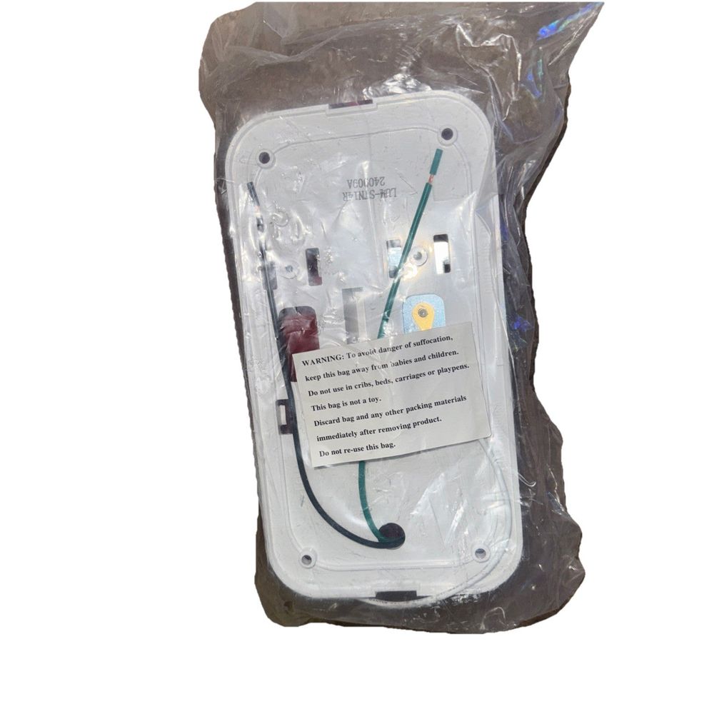 Lumitronics Surface Mount Tail Light for Safe Driving On The Road – a white plastic bag with a white plastic bag and a white plastic bag wi…