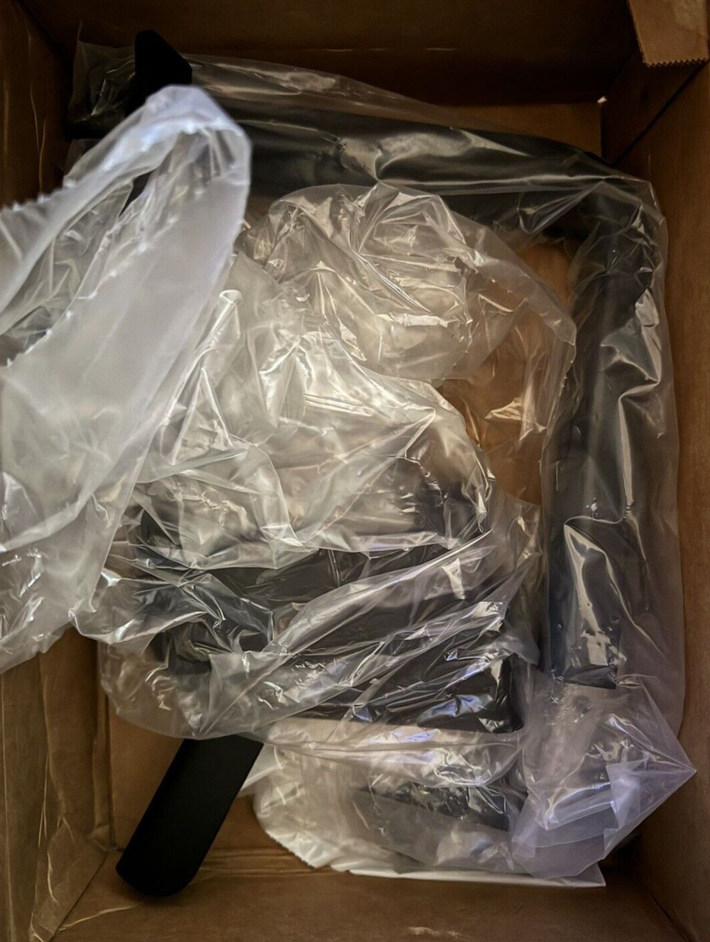 Luverne Truck Equipment 401473 Step Mounting Bracket 3 Pack – a box with plastic bags and a black handle