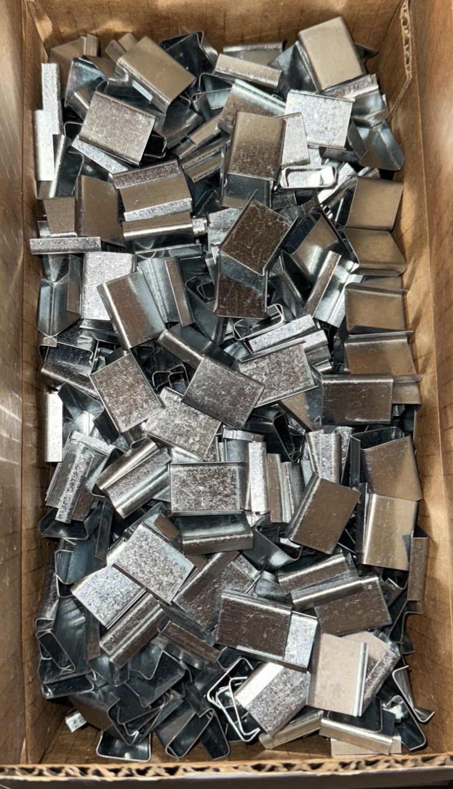 S-828 3/4" Open metal Seals 1000 Pack, DaveyDooDeals – a box full of silver and silver foil