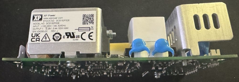 Mouser Electronics GCS150PS28 XP Power – Reliable 150W Power Supply for Industri – a small electronic device with a blue plastic cap