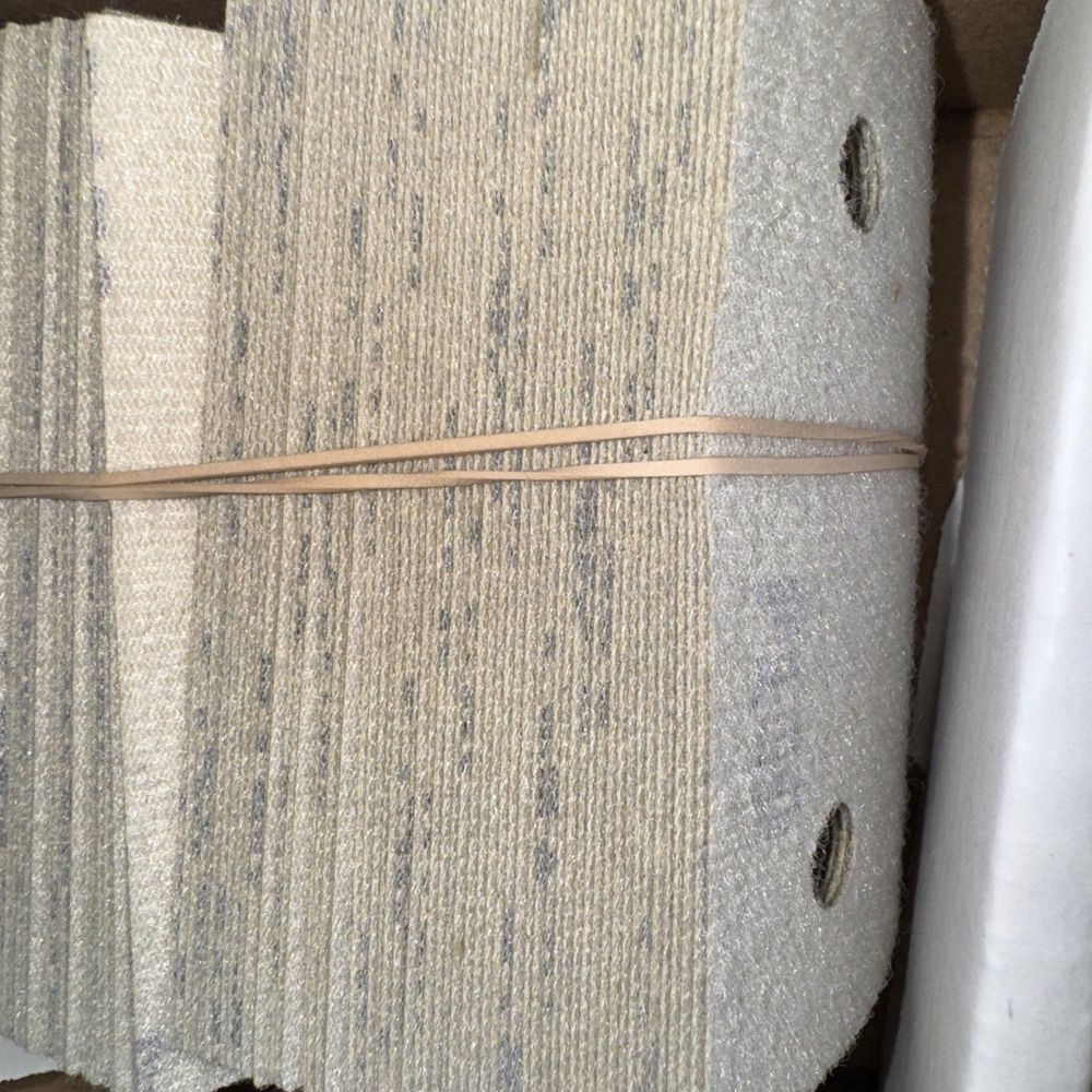 Uneeda 3" x 4" EKASTORM Hook & Loop Paper Sanding Sheets 150 Grit 100 Pack – a piece of carpet is taped and taped
